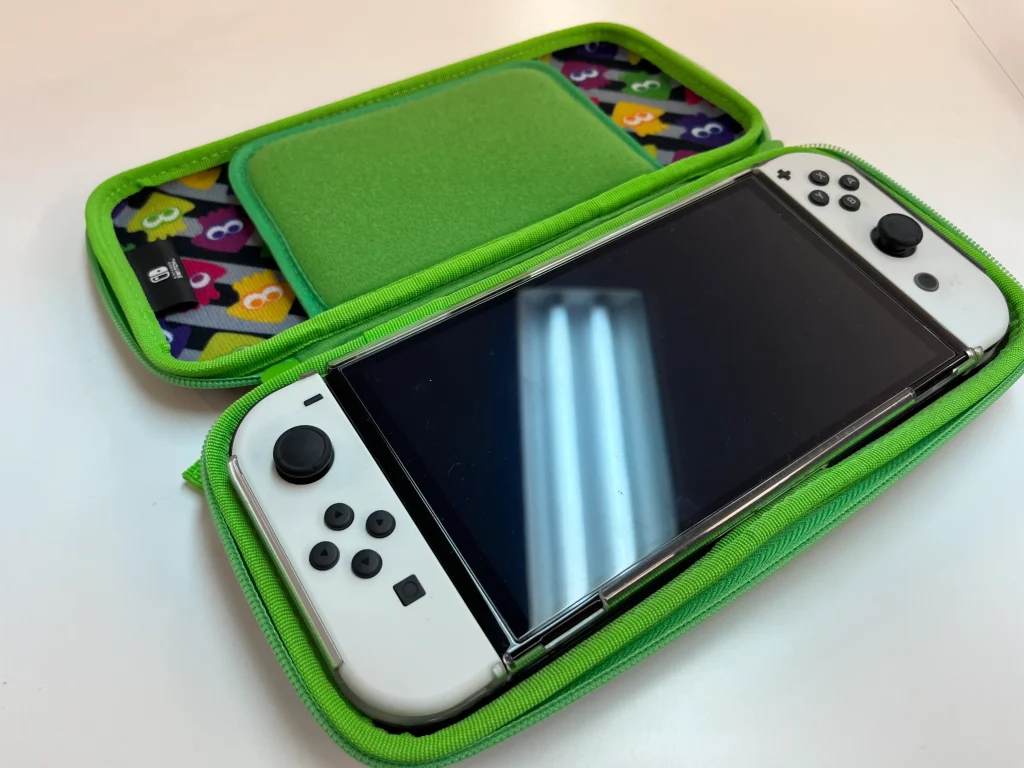 ケースに収納されたNintendo Switch有機ELモデル（ホワイト）｜札幌市西区アルファロジック琴似駅前店での買取事例